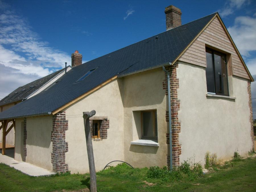 Maison après travaux de rénovation de la charpente avec modification du pignon